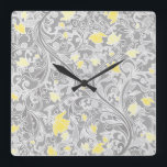 Relógio Quadrado Swirly amarelo e cinzento moderno floral<br><div class="desc">O teste padrão floral feminino moderno bonito que caracteriza redemoinhos das cinzas e o amarelo e flores pastel elegantes do ouro entrelaçou em um fundo cinzento mais escuro.</div>
