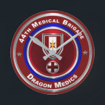 Relógio Redondo 44th Medical Brigade Dragon Medics<br><div class="desc">Display your pride in our 44th Medical Brigade – “The Army’s Premier Medical Brigade – Dragon Medics” This is my newly designed Custom Designed Wall Clock and makes a wonderful gift to any who having family members serving or have served in this unique Brigade! The 44th Medical Brigade has been...</div>