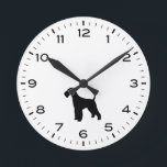 Relógio Redondo Airedale Terrier Dog Silhouette<br><div class="desc">Um relógio de parede divertido para casa ou escritório. Faz um presente original para amantes de Airedale Terrier. Veja o Doodle World de Jenn para mais relógios decorativos e cães que criem a decoração doméstica.</div>