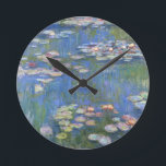 Relógio Redondo Claude Monet // Lírios De Água<br><div class="desc">Water Lily é uma série de aproximadamente 250 pinturas de óleo pelo impressionista francês Claude Monet (1840-1926). As pinturas retratam o jardim floral de Monet em Giverny e foram o principal foco da produção artística de Monet nos últimos 30 anos de sua vida.</div>