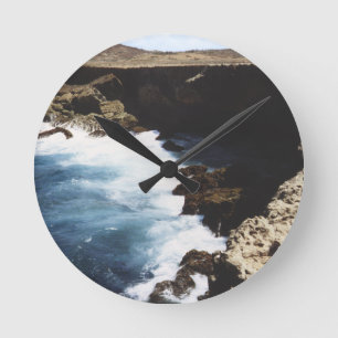 Relógio Redondo Oceano de Aruba que deixa de funcionar nas rochas