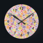 Relógio Redondo Pop de Cor Flores Selvagens<br><div class="desc">Pop de cor Flores selvagens apresentam desenhos feitos à mão,  florais de aquarela em cores brilhantes e felizes,  incluindo pinks,  laranjas,  roxas,  amarelos,  verdes. Adicione um pop de cor à sua decoração com decor doméstico da nossa Coleção de Pop de Cor! Misture e combine.</div>