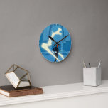 Relógio Redondo Ron Weasley Patronus Painting<br><div class="desc">Step into the Wizarding World with this dynamic Ron Weasley design, capturing a powerful moment of magic in motion. Ron is mid-cast as a luminous Patronus bursts forward in a brilliant sweep of light. The glowing spell contrasts beautifully with the cool blue tones of the castle interior, creating a striking,...</div>