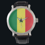Relógio Sinalizador Senegal<br><div class="desc">A bandeira senegalesa é uma tribanda vertical com um emblema no centro. As cores usadas na bandeira são vermelho,  verde,  amarelo. A proporção da bandeira senegalesa é de 2:3. A bandeira do Senegal foi adotada em 1960.</div>