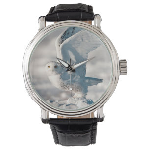 Relógio Snowy Owl a sair da neve