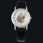 Relógio Vintage Santa Claus e Reindeer Christmas<br><div class="desc">Um relógio com uma ilustração de Natal divertida. Papai Noel em seu terno vermelho tradicional cavalgando uma rena grande e picada decorada com o Holly. Uma árvore de Natal nas costas.</div>