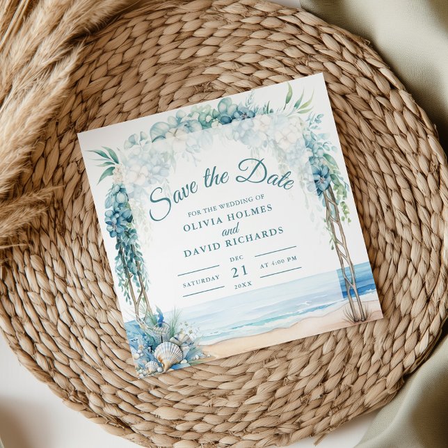 Reserve A Data Arco Floral Boho Costeiro Casamento Save the Date (Boho Coastal Floral Arch Wedding Save the Date on a boho wedding table.)