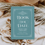 Reserve A Data Marque Nosso Casamento De Cobrir Aqua Vintage Com<br><div class="desc">Esse casamento exclusivo salva os cartões de data para os amantes de livros, apresenta um design de cobrir de livro antigo com um pergaminho que enquadra a data do casamento, um título do ornamentado "Livro Nossa Data", os nomes Bride & Groom como autores, um fundo azul aqua mutado / cor...</div>
