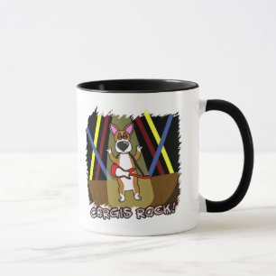 Rocha na caneca do Corgi de Galês do Pembroke