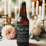 Rótulo Para Garrafa De Cerveja Casamento Simples Minimalista Obrigado Branco em P<br><div class="desc">Adicione alguma aula à sua celebração de casamento com estas etiquetas de garrafa de cerveja. Eles apresentam um design simples, mas elegante, com caligrafia branca sobre fundo preto. O texto diz: Obrigado por celebrar conosco. Há espaço para o tipo de cerveja, os nomes do casal e a data do casamento....</div>