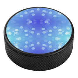 Round blue Bluetooth speaker with a front design
