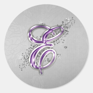 Roxo e etiqueta do monograma E do brilho da prata