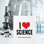 Sacola Ecológica Adoro o modelo Atom de cientista personalizado da<br><div class="desc">Cute I Love Science reutilizável bolsa de compra personalizada com seu nome. Possui um modelo atômico em frente ao coração. Um presente perfeito para um professor de ciência.</div>