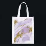 Sacola Ecológica ID da Festa de casamento da Abstrato da Lavanda de<br><div class="desc">Esse design personalizado com abstrato de tinta a álcool em tons de lavanda macia a roxo lilás com sotaques de ouro brilhantes, é perfeito para um tema romântico e elegante de casamento. A design de mala de compras coordenada mostrada aqui, fornece uma modelo para adicionar facilmente o membro da festa...</div>