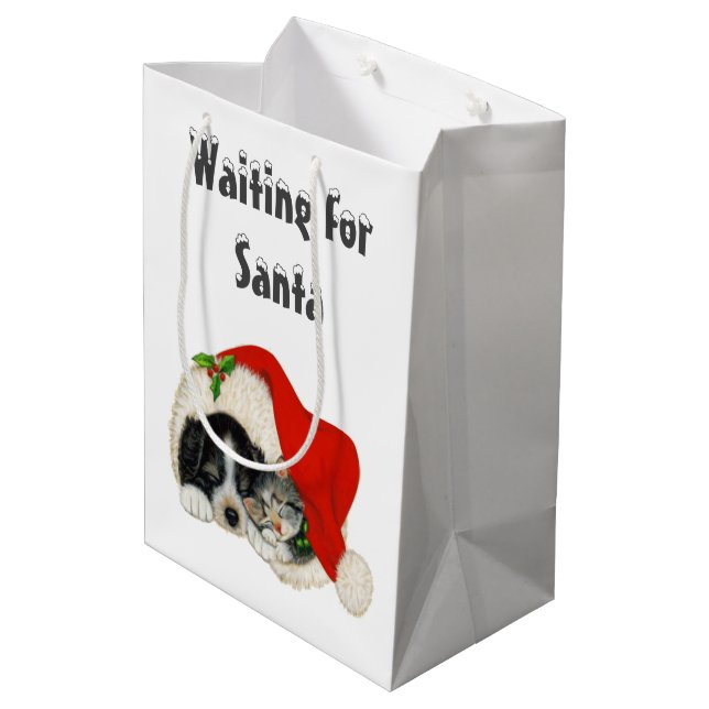 Sacola Para Presentes Média Aguardando Papais noeis com a barra de presentes (Verso inclinado)