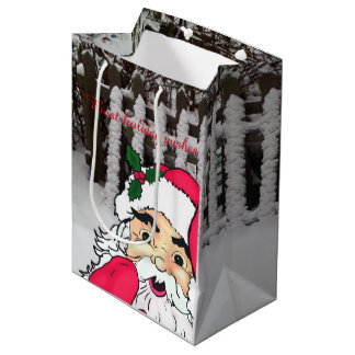 Sacola Para Presentes Média Claus personalizados de Papai Noel em uma cerca de
