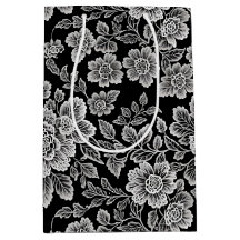 Florais de rendas brancas em preto