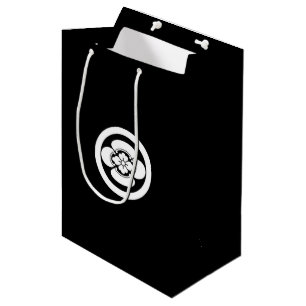 Sacola Para Presentes Média Mokko em um círculo
