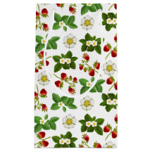 Fruta da morango com o saco do presente das flores