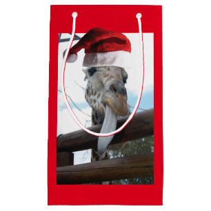 Sacola Para Presentes Pequena Girafa vestindo um chapéu de Papai Noel
