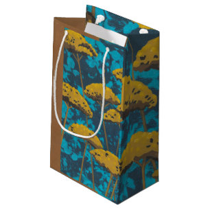 Sacola Para Presentes Pequena Ouro Yseta Garden com fundo azul