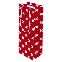 Pontos de cruz brancos em vermelho