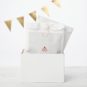 Sacolinha design de uma flor vermelha sobre fundo branco