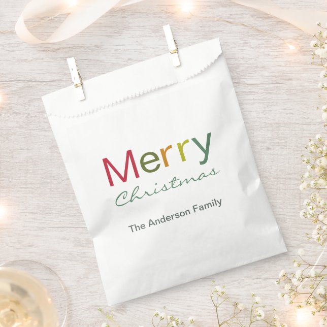 Sacolinha Feliz Natal - Festa colorida da família de texto (Cortado)
