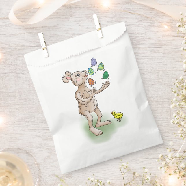 Sacolinha O Coelhinho da Páscoa juga com os ovos da Páscoa (Cortado)