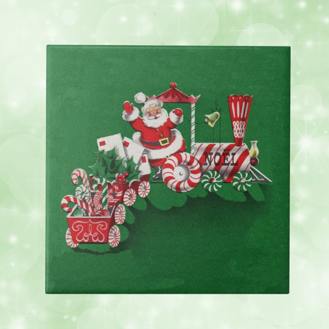 Santa Clause Candy Train (Santa riding red and white train with letters candy canes with peppermint wheels on green tile.)