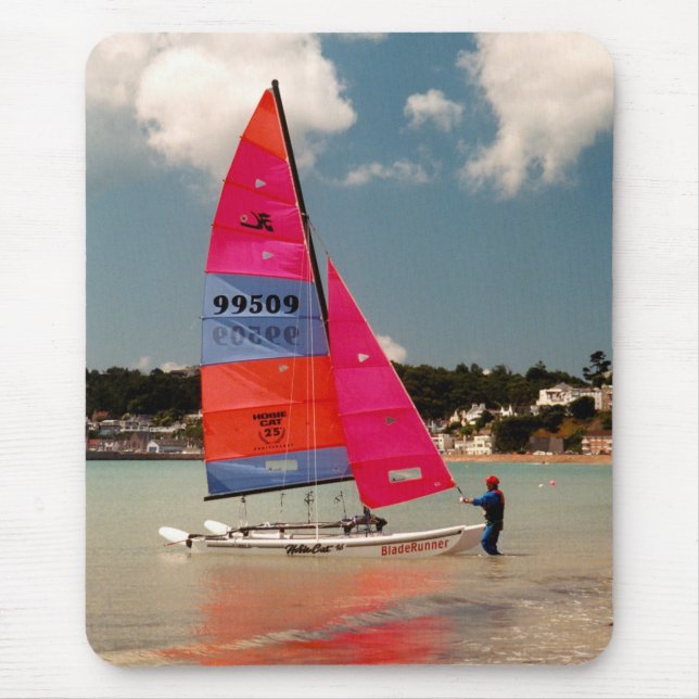 Segurando a haste do Hobie com o mouse pad (Frente)