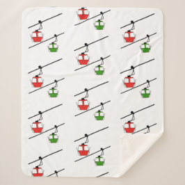 Sherpa gondolas vermelhas e verdes no cobertor branco