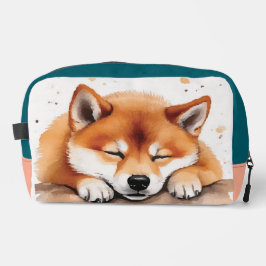 shiba ganhando mala de higiene tricolor sonolenta