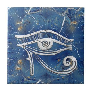 Silver Egyptian Eye of Horus on blue marble