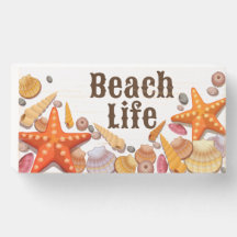 Sinal de caixa de madeira da vida na praia