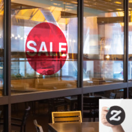 Sinal de venda de vinil em janela grande transpare