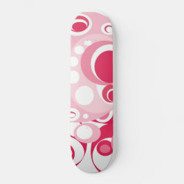 Skate das meninas no rosa e no vermelho