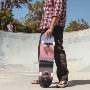 Skate Pôr do sol caribenho rosa sobre o mar calmo 1