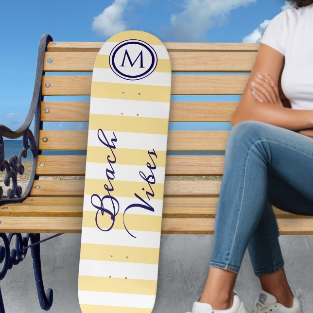 Skate Vibrações de Praia Amarelo Branco Listras Monogram (A striped yellow and white skateboard with monogram initial and 'Beach Vibes' in script typography)