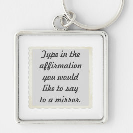 Sua afirmação em um design de Chaveiro espelhado