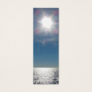 Sun sobre a fotografia do oceano