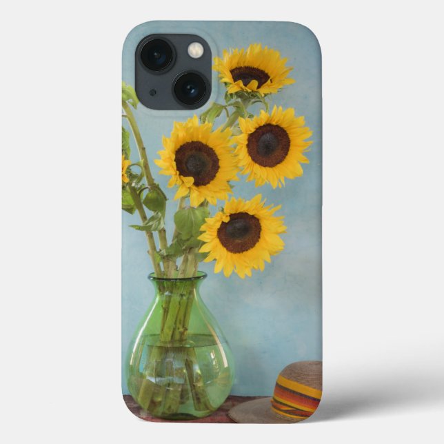 Sunflowers in vase on table (Verso)
