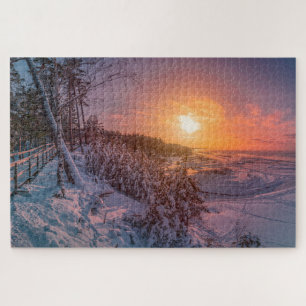 Sunset sobre a costa da neve quebra-cabeça