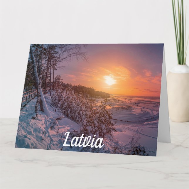 Sunset sobre o cartão da costa da neve (Frente)