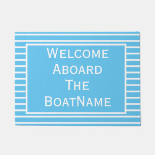 Tapete Boas-vindas, azul e branco, à porta do barco