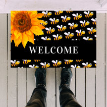 Boias negras de girassol bem-vindas