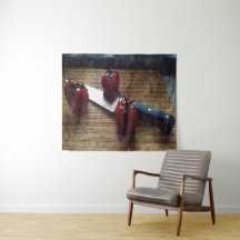 Três tomates vermelhos num conselho