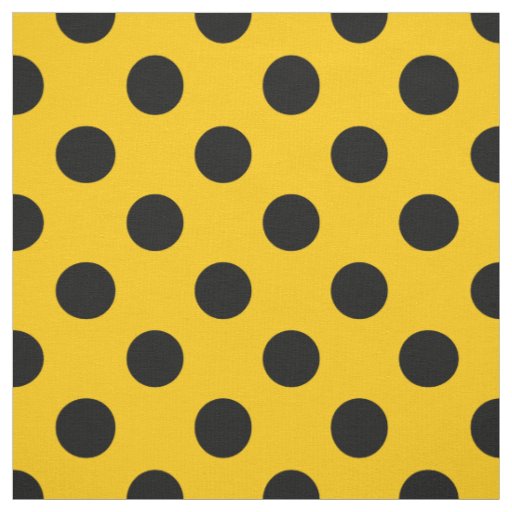 Uma bola amarela é cercada por ondas pretas e amarelas.