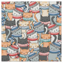 Gatos no padrão de escarpas e chapéus de inverno