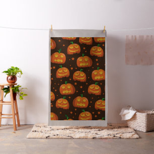 Tecido Padrão de cabeça de abóbora de Halloween.